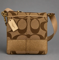 Coach Signature Canvas Swingpack Crossbody with metallic gold stripe